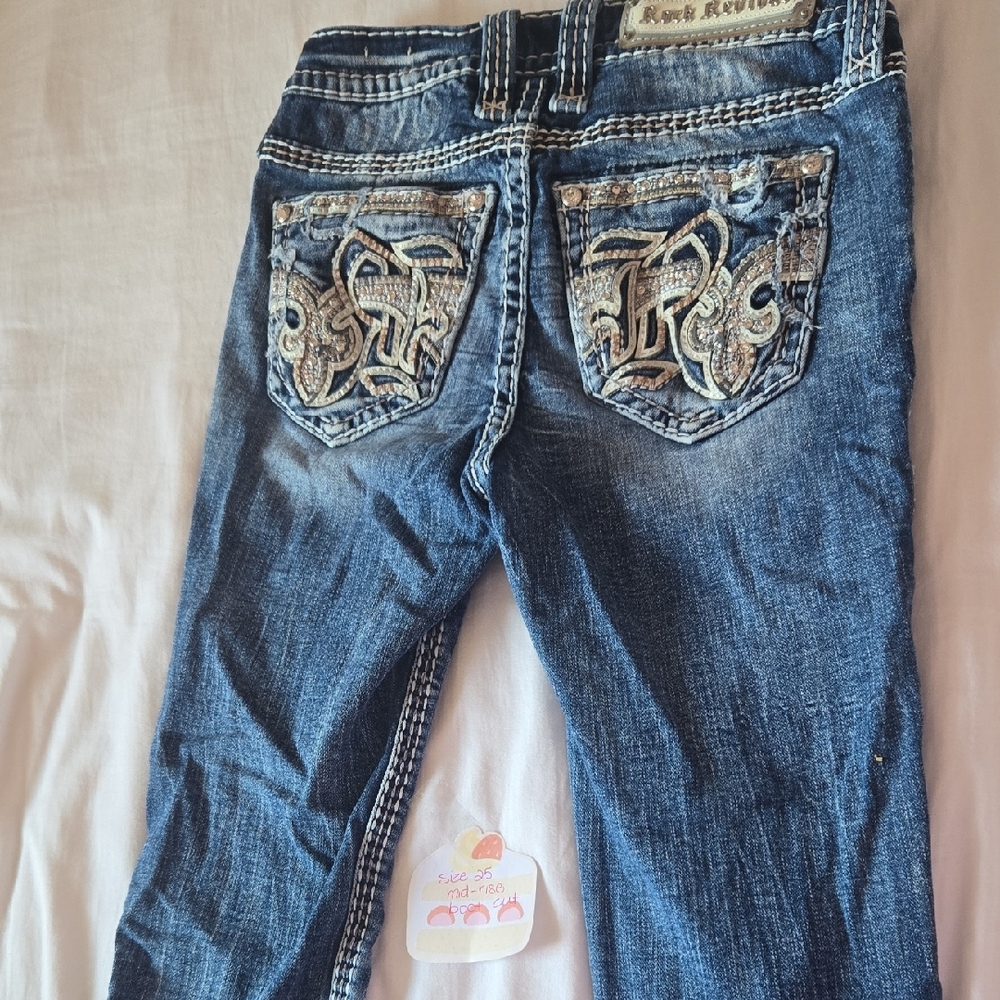 Rock Revival Blue Boot Cut Jeans with Ornate Design